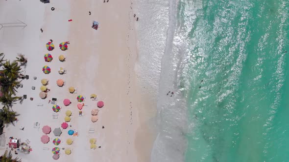 Aerial Top Paradise Beach with Umbrellas and Turquoise Ocean Nungwi Zanzibar alt