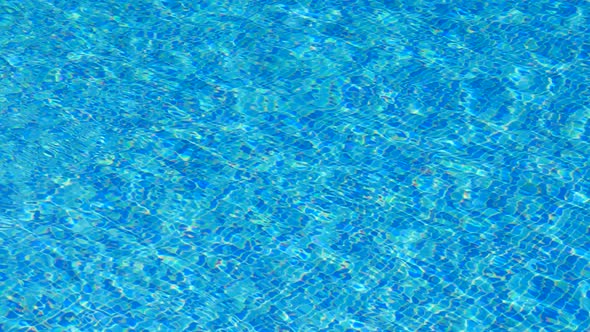 Abstract pool water crystal clear with sunlight reflect alt