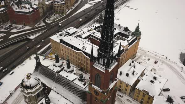 Famous tourist destination and landmark, Riddarholm church, Stockholm, Sweden,  rotating aerial shot alt