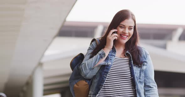 Young Caucasian woman on phone alt