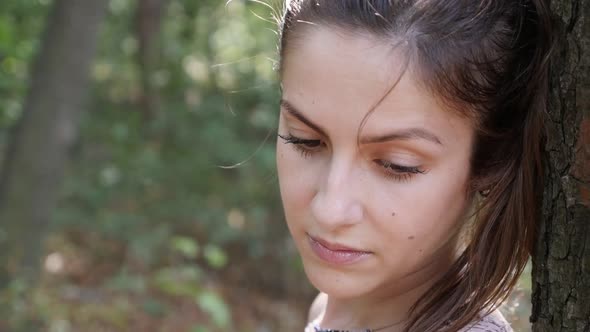 Young woman in the forest slow motion footage