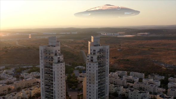 Ufo flying saucer Close to City at Golden Hour- Aerial  alt