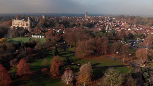 Warwick Town Aerial Drone View, Park, River, Churches And Castle In Autumn, Panning Out