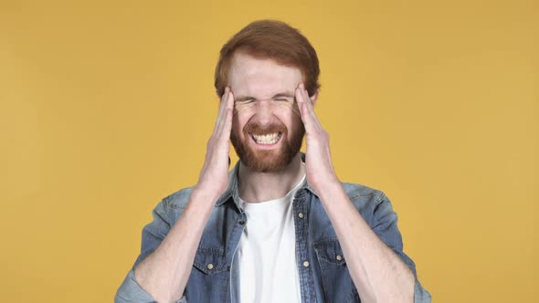 Redhead Man with Headache Yellow Background alt