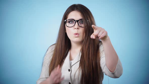 Shocked Surprised Woman Pointing alt