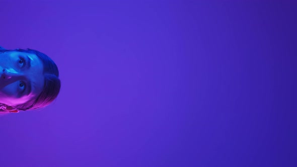 Scared Woman Worried Face Neon Light Portrait alt