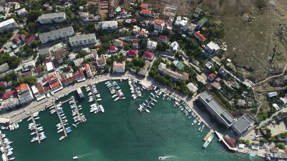 Aerial Panoramic View of Balaklava Landscape with Boats and Sea in Marina Bay alt