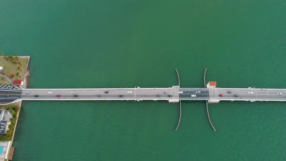 Aerial Above Traffic Crossing Bridge Green Water Florida Keys alt