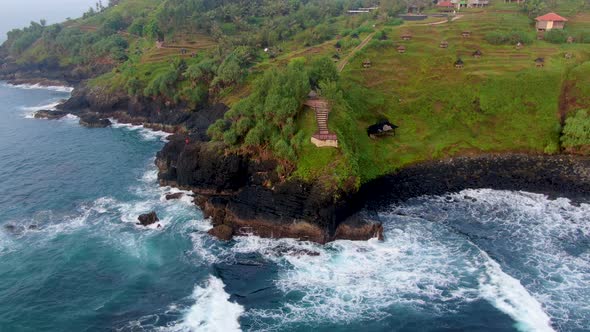 Aerial view on viewpoint platform on cliff near Menganti beach on Java Indonesia alt