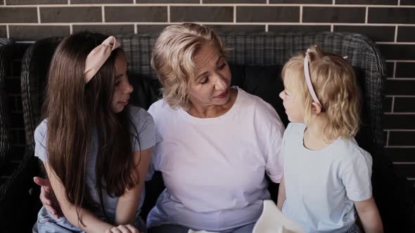 Grandmother Communicates with Two Granddaughters