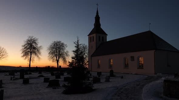 Nordic Church and Cemetery at Sunset with Copyspace Pan