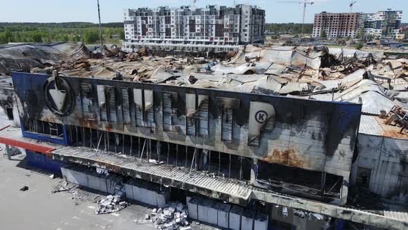 War in Ukraine  Destroyed Building of a Shopping Center in Bucha alt