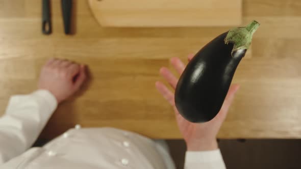 Cook Throws Up Aubergine And Catches It