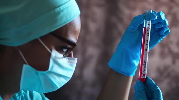 Doctor hands holding a coronavirus COVID-19 negative test tube