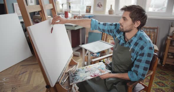 Male Artist Starting Painting Artwork