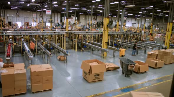 Warehouse, logistics center with cardboard boxes on pallet racks. Big big modern warehouse alt