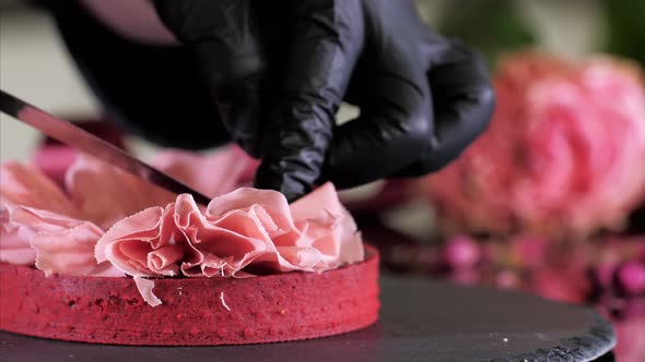 Confectioner Is Making a Dessert with Petals From Pink Chocolate