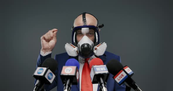 Politician wearing a respirator and giving a speech, coronavirus prevention concept