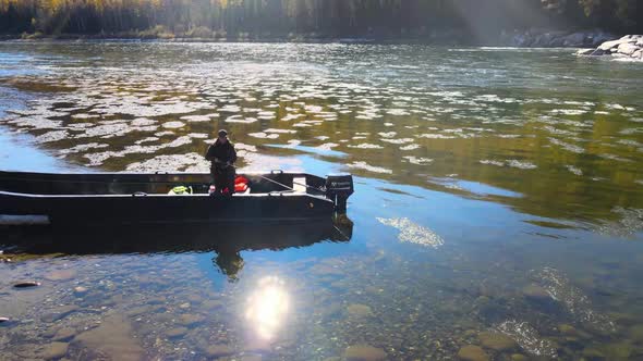 Man Casts Spinning Sunny River Mountains Autumn
