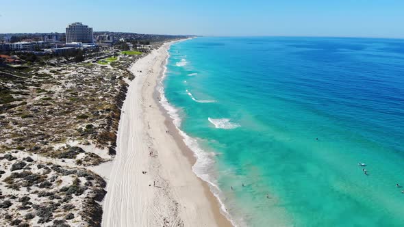 Aerial view of Tourists at a Beach in Australia	 alt