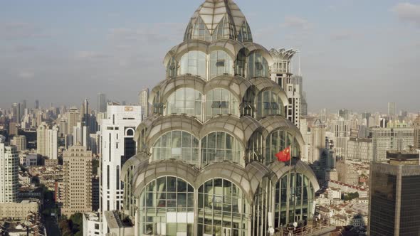 Aerial view of a skyscraper roof in Shanghai downtown, China. alt