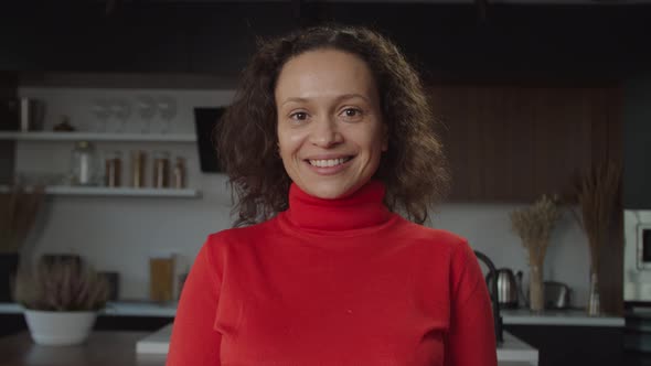 Closeup Portrait of Carefree Excited Pretty Woman Laughing with Infectious Laughter Indoors alt