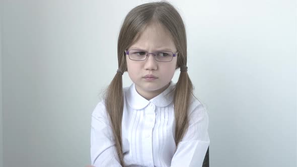 Sad School Girl in White Blouse and Glasses alt