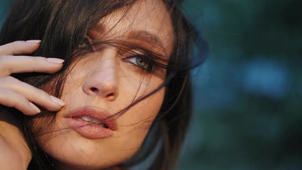 Close-up Face of Cute Pensive Brunette Woman alt