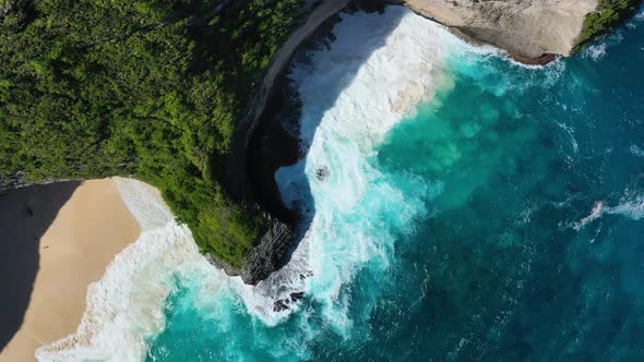 Nusa Penida Island, Indonesia.Coast and Waves as A Background from Top View.  alt