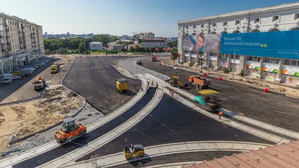 Asphalt Paver, Roller and Truck on the Road Repair Site During Asphalting Timelapse. Road alt