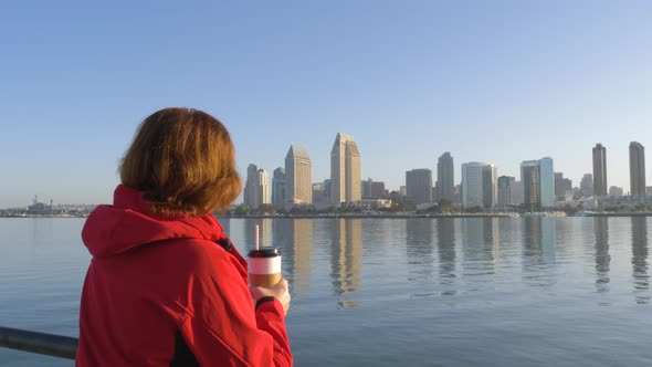 Woman Drinking Coffe at Morning on San Diego City