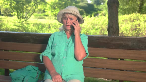 Nervous Woman with Phone alt