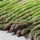  Fresh raw organic green mini asparagus in a row close up - VideoHive Item for Sale