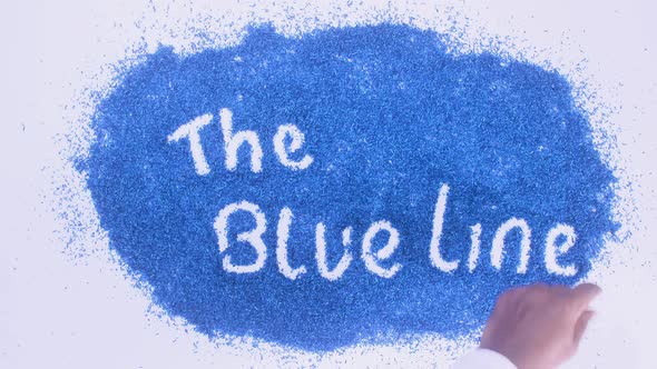 Indian Hand Writes On Blue The Blue Line