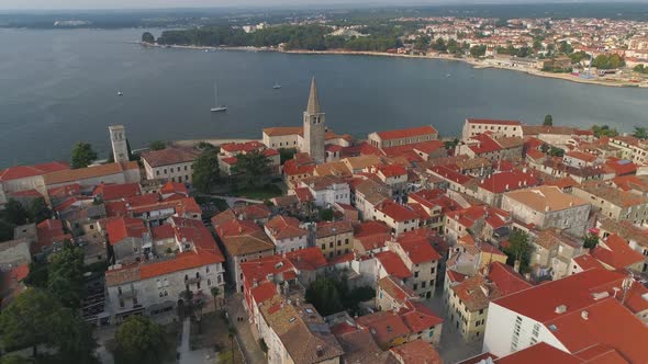 Aerial view of Euphrasian Basilica of Porec, Parenzo at evening alt