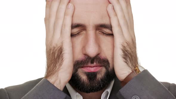 Portrait of Male Worker in Business Outfit Being Frustrated and Exhausted Covering His Face with alt