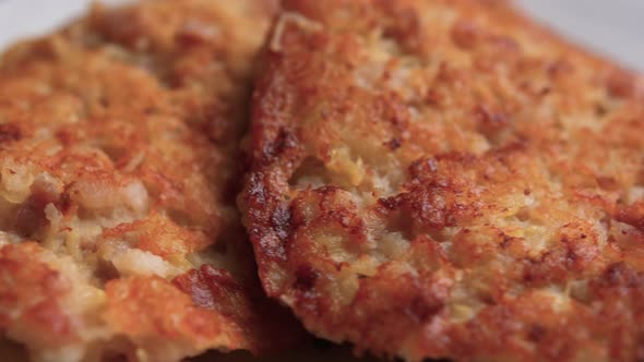 Three Patties Rotating with a Plate alt