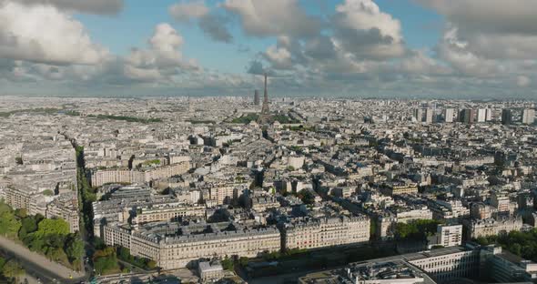 Aerial Drone Distant Sunset View of Tour Eiffel Tower and Seine River Bridge Traffic Cars Driving alt
