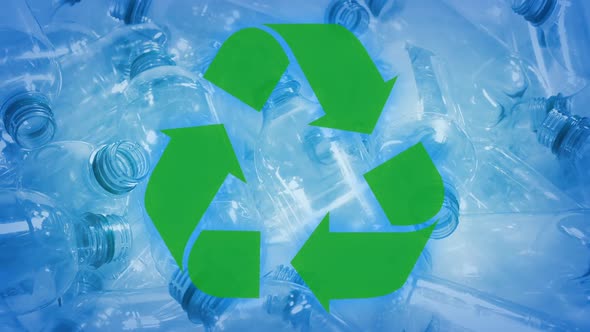Recycle Symbol With Pile Of Plastic Bottles At Plant alt
