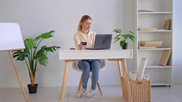 Young Caucasian Woman Pays Bill alt