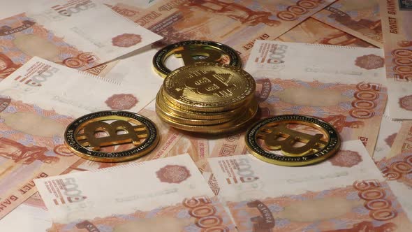 Bitcoin BTC Coins Rotating on Bills of 5000 Russian Rubles. Worldwide Virtual Internet alt