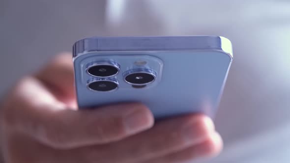 Typing message in messenger application online on new mobile phone device alt