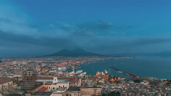 Naples, Italy. 4K Top View Skyline Cityscape In Evening Lighting. Tyrrhenian Sea