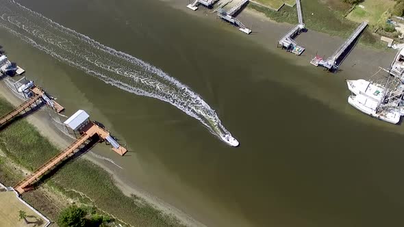 Tracking a boat in the intracoastal waterway in southeastern NC on a bright, sunny day. alt