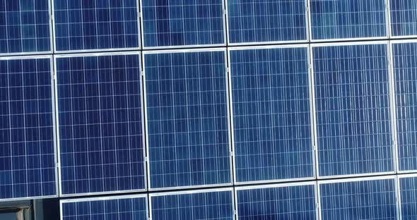 Slow panning over solar panels. alt