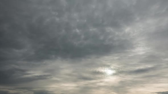 Time Lapse of Majestic Gray Cloudy Sky with Sun Over Horizon. No Birds, No Flicker.
