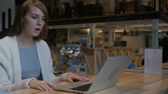 Young Woman Upset by Loss of Work alt