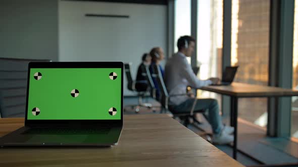 Ready for Track Green Screen Notebook Laptop PC with Call Centre Employees alt