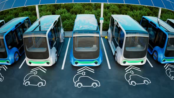 Electric cars charging station. Minibuses stopped to charge the batteries. alt