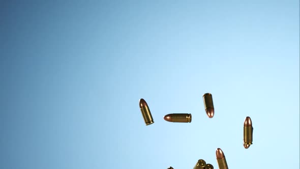 Bullets falling bouncing in ultra slow motion 1500fps on a reflective surface - BULLETS alt